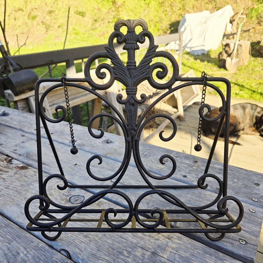 Elegant Black Metal Scrollwork Stand